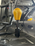 ZeroPointOne carbon gear shifter extender showing billet aluminium base and carbon shaft detail